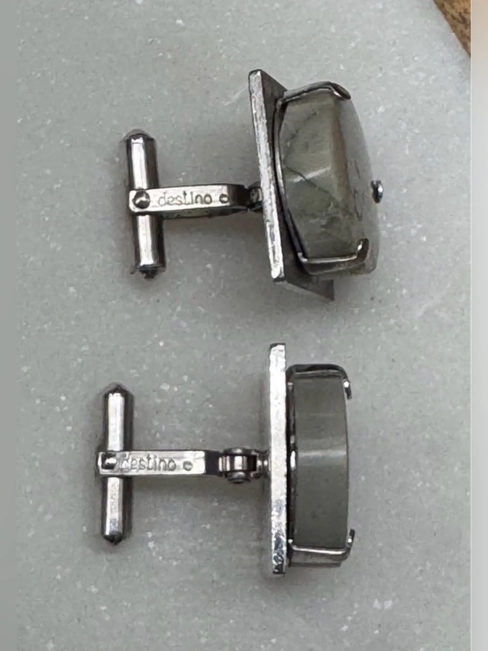 Vintage mid-century Destino cufflinks feature distinctive domed gray stones.